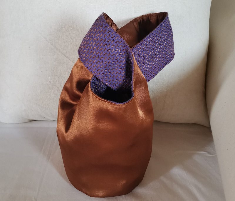 Knot morado-bronce
