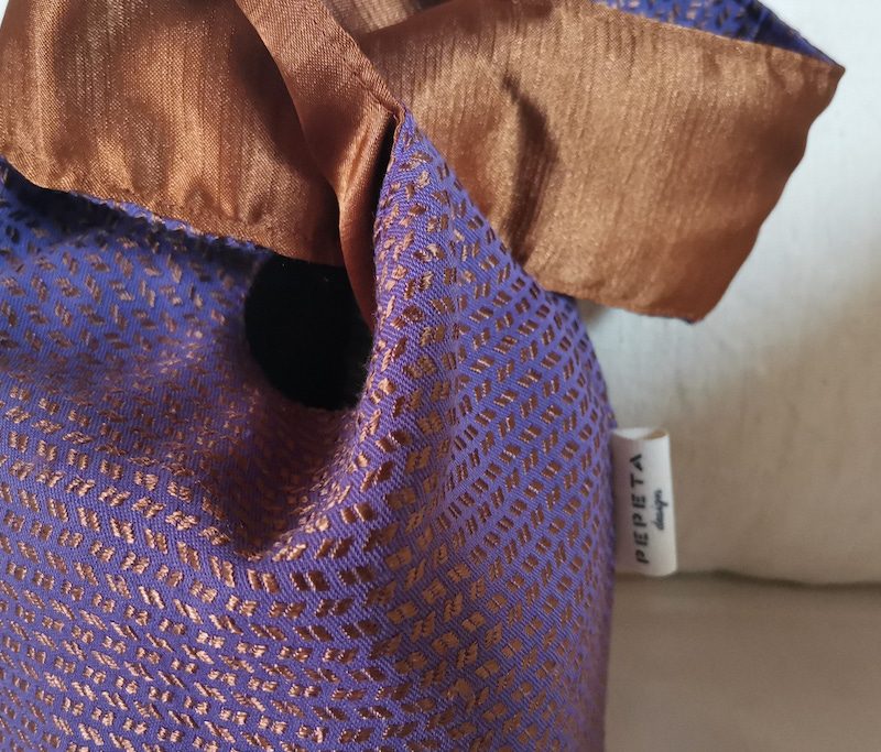 Knot morado-bronce