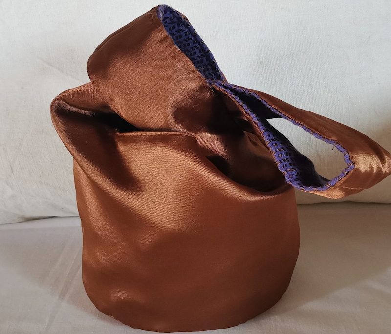 Knot morado-bronce